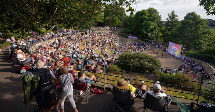 hundreds of people sat watching brass bands perform in Wharton Park, Durham City.